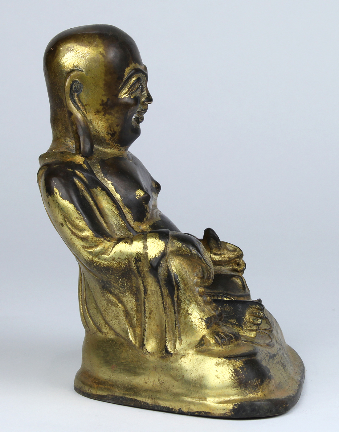 Chinese gilt bronze Budai, wearing loose robes, sitting in royal ease with right hand holding prayer - Image 3 of 5