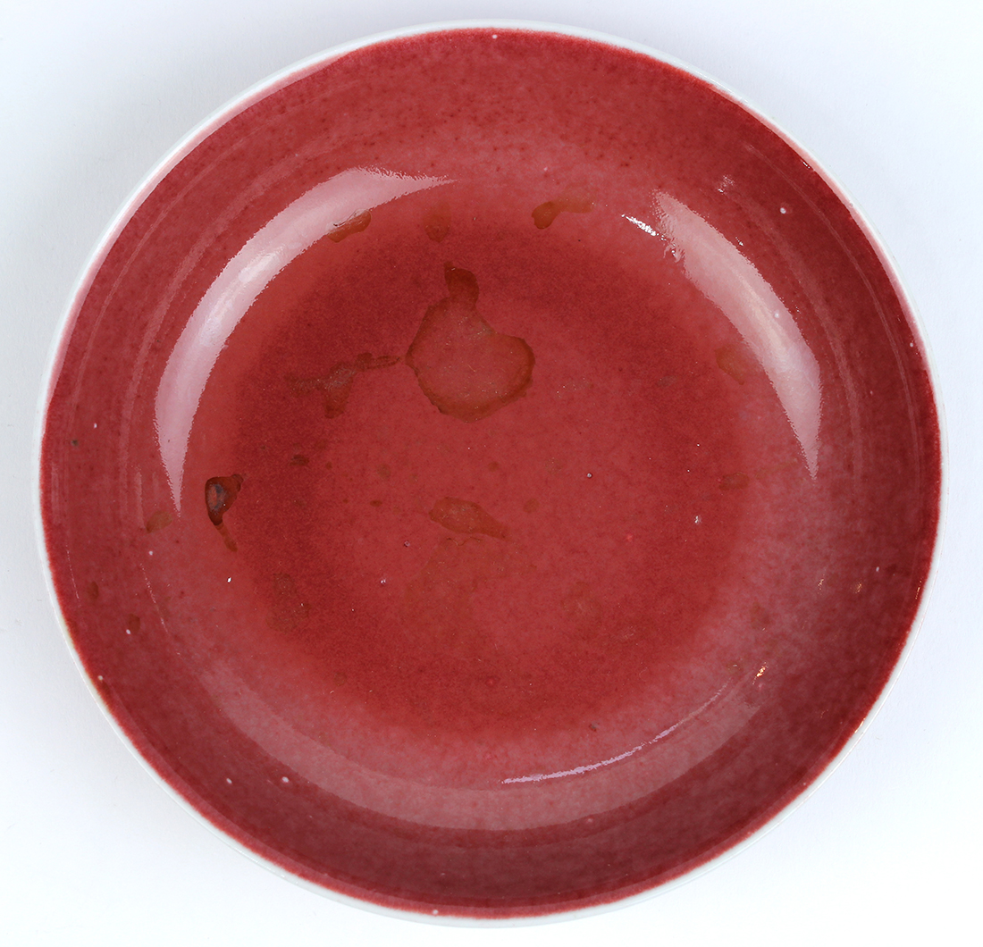 Chinese ox blood glazed porcelain plate, base with apocryphal Qianlong mark in underglaze blue, 6.