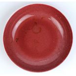 Chinese ox blood glazed porcelain plate, base with apocryphal Qianlong mark in underglaze blue, 6.