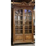 Louis XVI style vitrine, the two door case with fluted pilasters flanking the bevelled and mullion