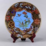 Japanese cloisonne enameled plate, Meiji period, central blue reserve depicting a butterfly amid