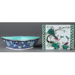 (lot of 2) Chinese porcelain pillow and blue dish: the first of rectangular form with depicting