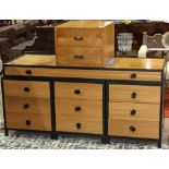 (lot of 2) Mid Century iron framed chest, having an oak case with stylized pulls, and rising on