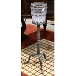 Art Deco crystal champagne bucket on stand, having a geometric decorated bucket with a silvered rim,