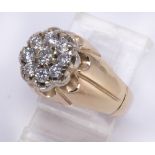 Diamond and 14k yellow gold ring Featuring (9) full-cut diamonds, weighing a total of