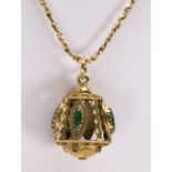 Jadeite and 14k yellow gold pendant-necklace Featuring (4) navette-shaped jadeite cabochons,