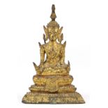 Thai gilt bronze seated Buddha, with a benevolent face and in bumisparsha mudra, seated above a