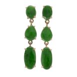 Pair of jadeite and 18k yellow gold earrings Featuring (4) oval and (2) pear-shaped jadeite