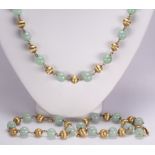 Jadeite, 14k yellow gold bead and gold-filled jewelry suite Including 1) necklace, composed of (19),