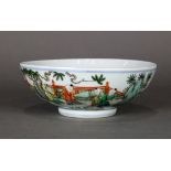 Chinese enameled porcelain bowl, famille verte decorated with children playing in the garden, base