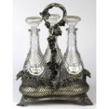 Victorian decanter set, having three decanters, each with a textured body, set in a fitted