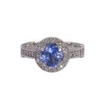 Sapphire, diamond and 14k white gold ring Centering (1) cushion-cut sapphire, weighing approximately