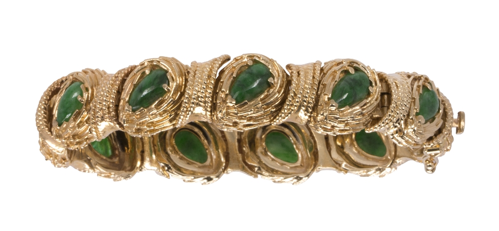 Jadeite and 14k yellow gold bracelet Featuring (11) pear-shaped jadeite cabochons, measuring
