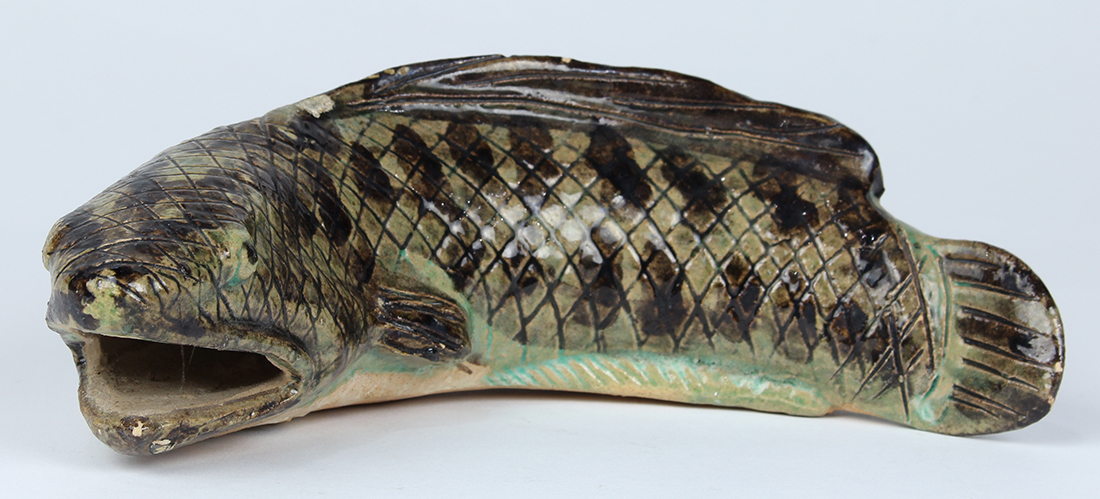 Japanese glazed ceramic wall vase, in the form on an eel, the body incised with a cross-hatch