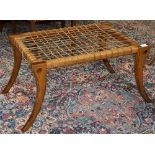 Neo Classic Klismos bench, having a leather cord top with carved outswept legs, 18"h x 32"w