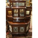 Victorian mahogany vitrine, having a mirrored superstructure with mullion doors above the demilune