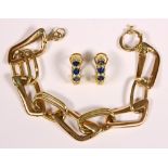 (Lot of 2) Sapphire, diamond and gold jewelry Including 1) pair of sapphire, diamond, 18k yellow