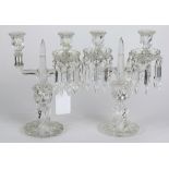 Pair of Baccarat candelabra, each having two lights, with scrolled arms, having prism drops, 13"h (