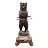 German Black Forest polychrome decorated and carved figural umbrella stand, in the form of a bear,