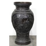 Japanese large bronze vase, having figural reserves and dragons, the tapering body featuring