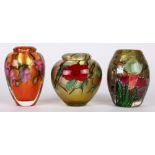 (lot of 3) Daniel Salazar for Lundberg Studios paperweight vase group, each having a tapered form in