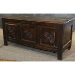 English oak coffer, late 18th/early 19th century, having a hinged top, above the carved case with