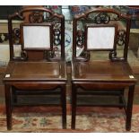 (lot of 2) Chinese hardwood chairs, the back inset with rectangular white marble panels framed