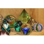 (lot of 25) Art glass paperweight group, consisting of spherical, egg, triangular and ovoid forms,