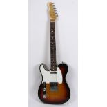 Fender Electric guitar, left handed, having a sunburst finish, in a fitted hardshell case, 48"l