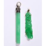 (Lot of 2) Jadeite, diamond and gold pendants Including 1) pendant, featuring (1) carved jade