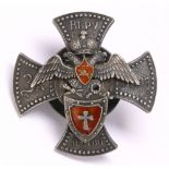 Russian Imperial silver military jeton, in the form of a cross, centered with a double eagle above a