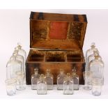 Dutch travelling tantalus circa 1800, having a fitted box opening to (12) decanters and (4) glasses,
