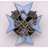 Russian Imperial silver military jeton, in the form of a light blue enameled cross, flanked with