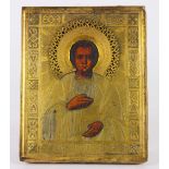 Russian icon, having a gilt oklad, and depicting Saint Panteleimon, 7"h x 6"w