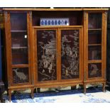 Continental cabinet with brass mounts, the central double doors inset with Chinese gilt panels