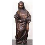 Spanish Colonial carved figural sculpture, 17th century, depicting a female saint, gazing