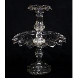 Cut crystal epergne, having a trumpet form with scalloped edges, above the shallow bowl,