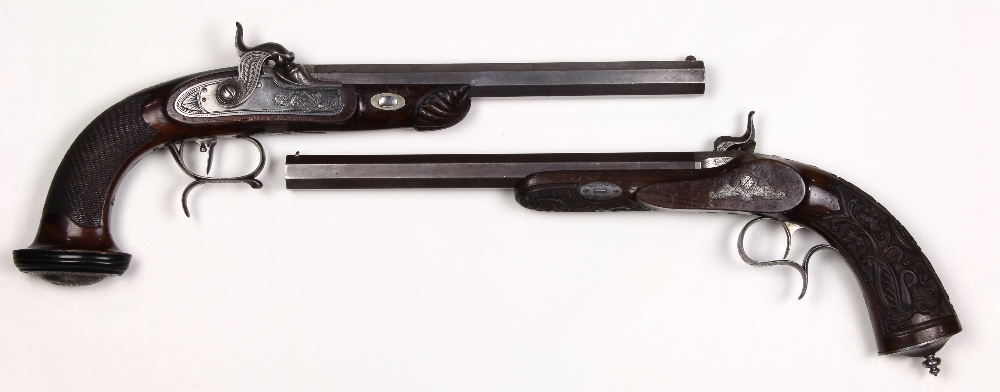 Cased set of French target pistols, mid-19th century, one dueling pistol with ornate foliate - Image 2 of 4
