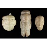 (lot of 3) Hardstone carved ethnographic figures, consisting of a figure and two masks, largest: 6.