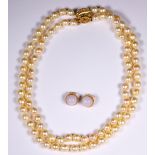 (Lot of 2) Cultured pearl, jadeite and 14k yellow gold jewelry Including 1) double strand