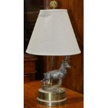 Stag form table lamp, rising on an oval base, 28"h