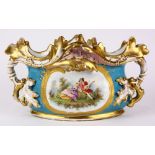 Old Paris porcelain centerpiece bowl, having partial gilt acanthus decorated handles above the