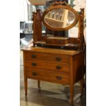 Victorian mirrored dresser, the upper case having a centered oval cheval mirror flanked by pierced