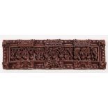 Indian carved wood panel, with a scene of dancing figures accented by elephants, birds and