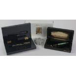 (lot of 2) Pelikan pens, consisting of a "Wall St" limited edition fountain pen, the whole etched