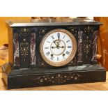Ansonia style slate mantle clock, having an open escapement and a white enamel dial with Roman
