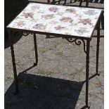 French bistro style occasional table, having a rectangular tile top above a patinated metal base,