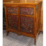 French style cabinet, fronted by a pair of doors inset with Chinese gilt lacquered panels carved