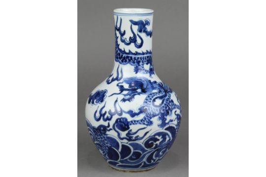 Chinese underglazed porcelain vase, with a cylindrical neck above a globular body featuring a - Image 1 of 6