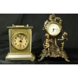 (lot of 2) German mantle clock group, consisting of Rococo Revival example with figural putti